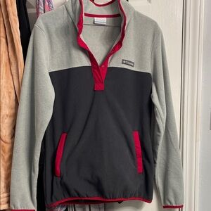 Columbia Black and Gray Pullover with Red Trim. Half button up. 2 pockets.